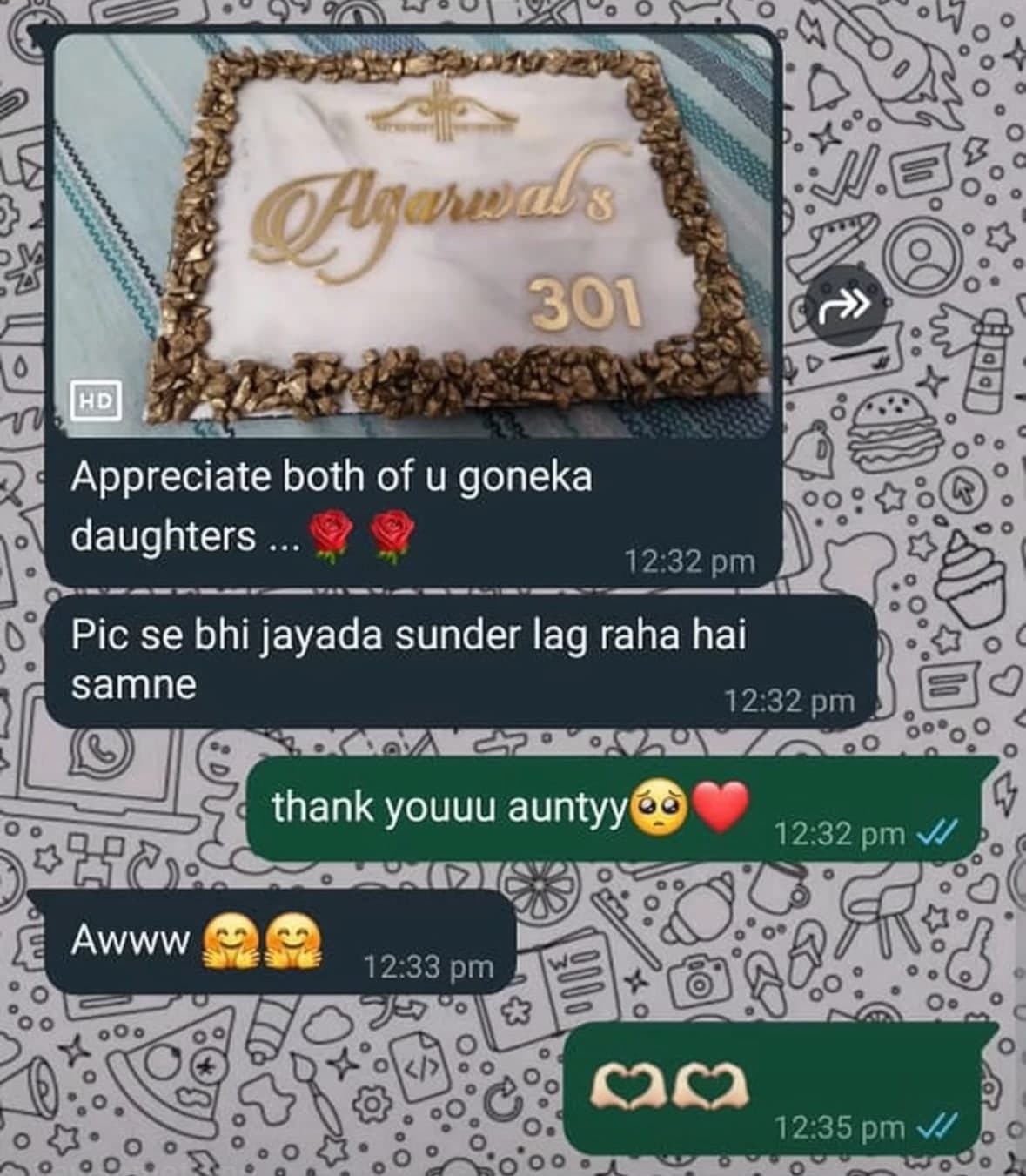 WhatsApp screenshot showing the finished Agarwal's 301 name plate with the messages 'Appreciate both of u goneka daughters' and 'Pic se bhi jayada sunder lag raha hai samne'
