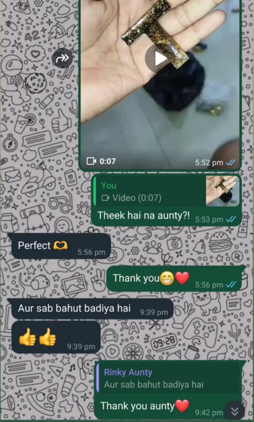 WhatsApp screenshot with a video of a gold-flecked letter keychain, the question 'Theek hai na aunty?!' and the replies 'Perfect' and 'Aur sab bahut badiya hai'